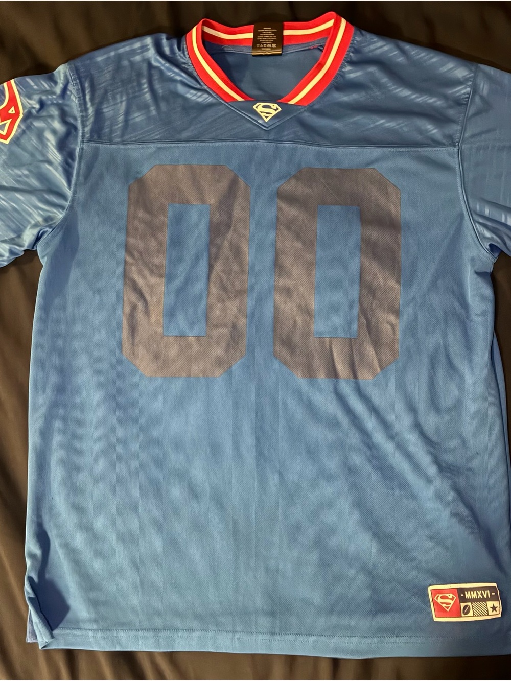 Superman Blue Jersey with Red and Yellow Collar Accents